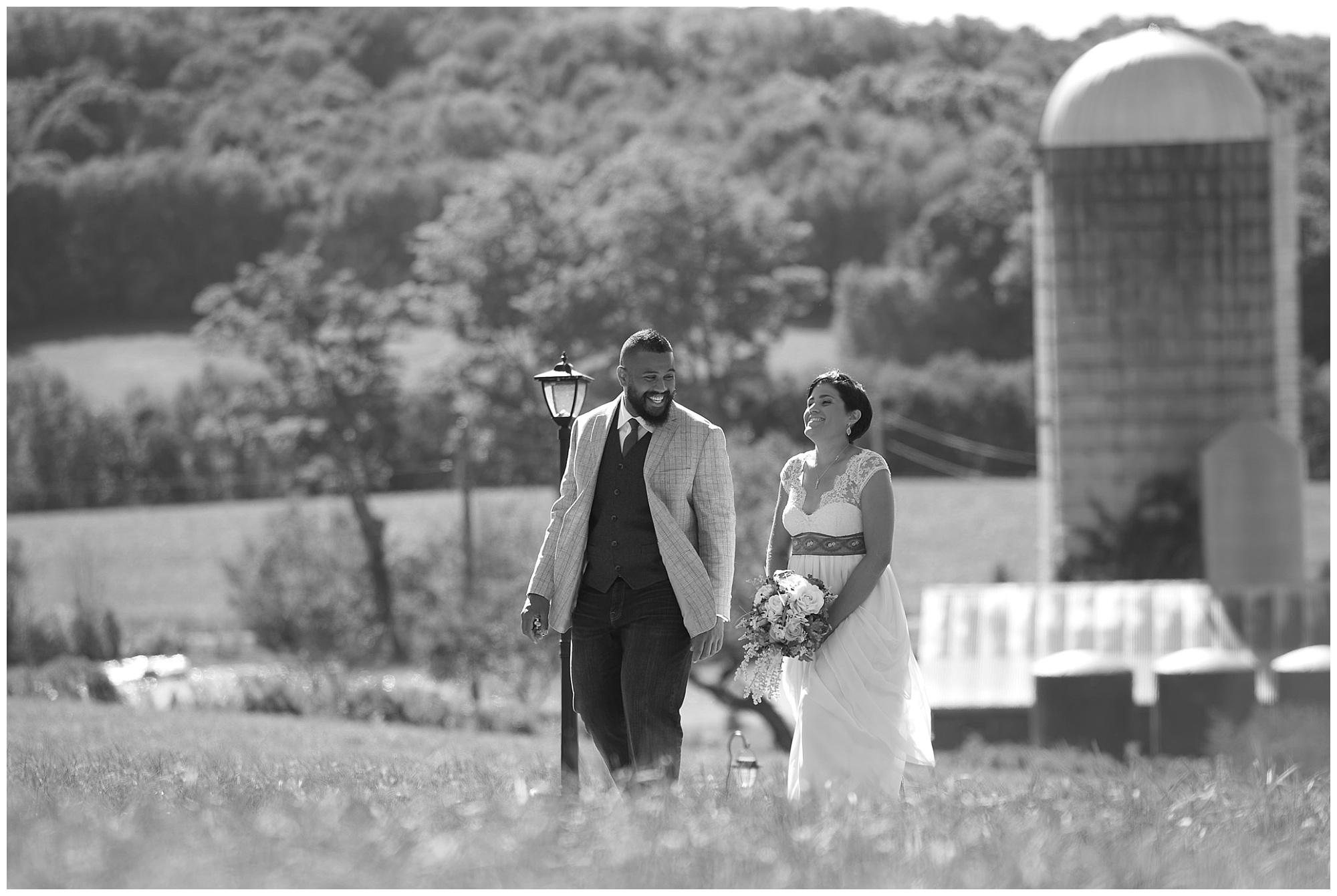 bride and groom walking together and laughing