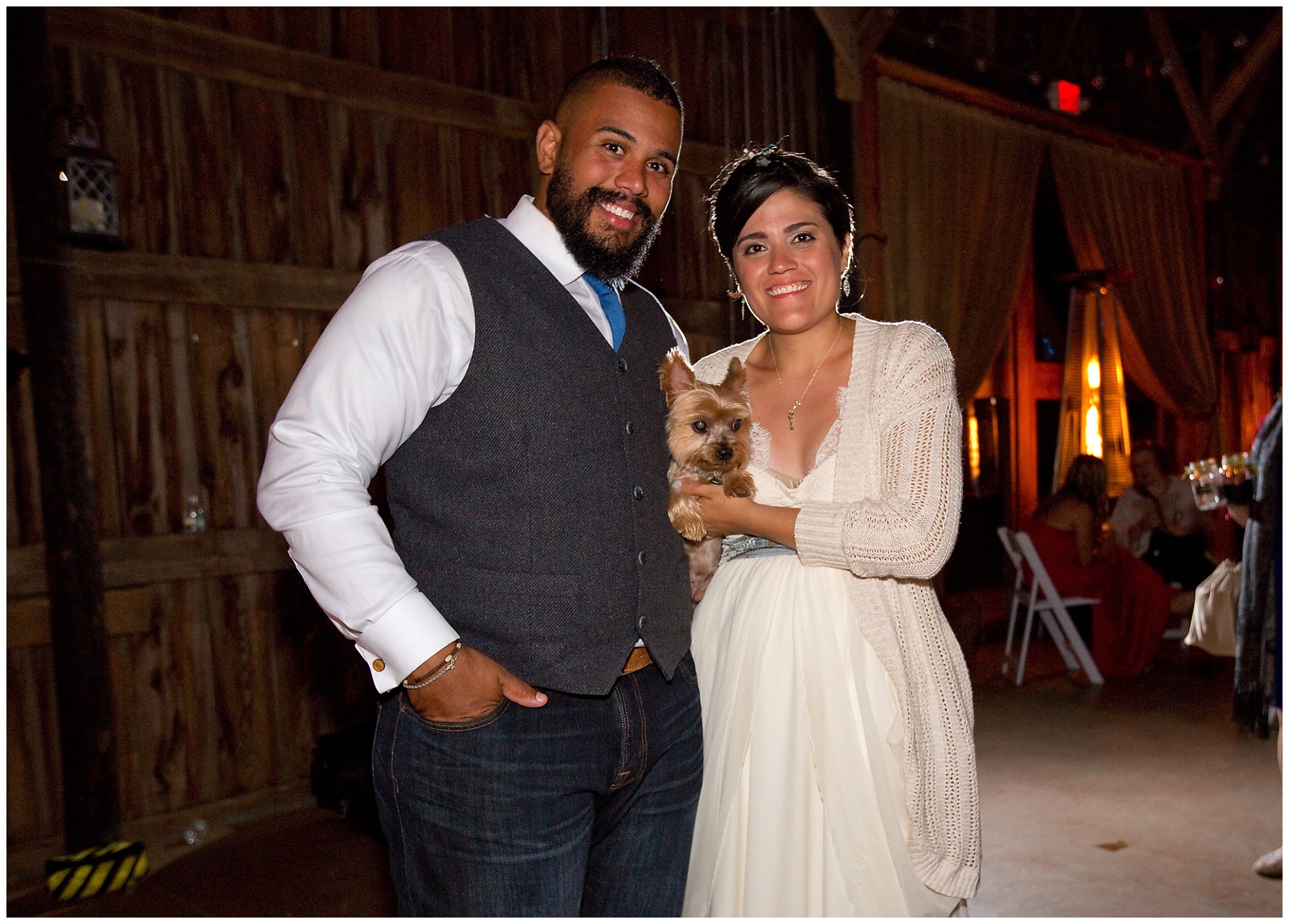 Photo of the bride, groom and thier dog.