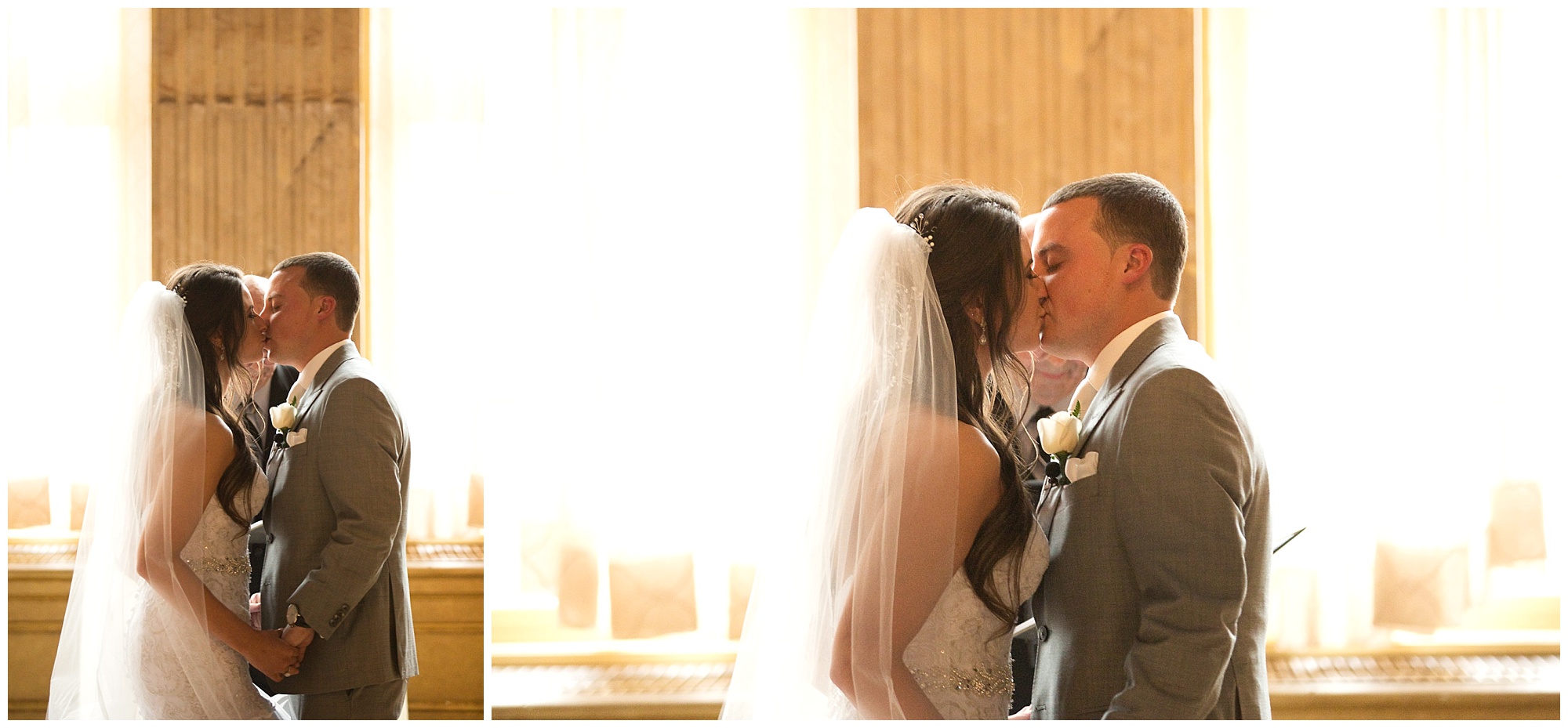 Photo of a bride and groom's first kiss at their ceremony.