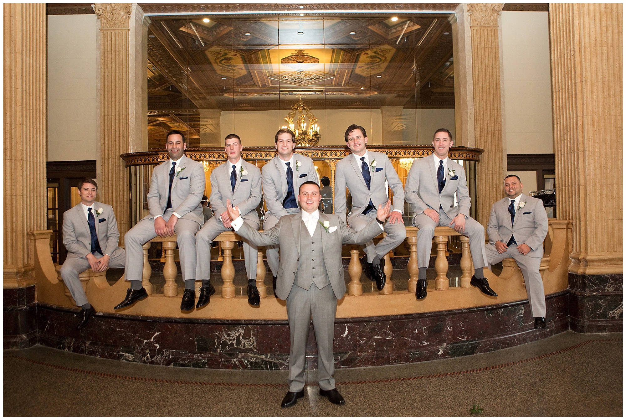 Photo of a groom and his groomsmen in a group portrait.