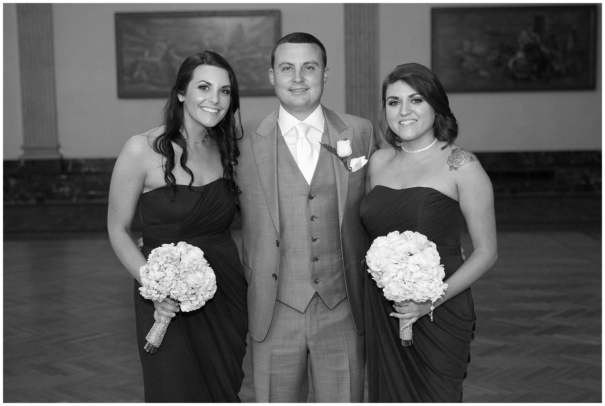 Photo of the groom with his sisters.
