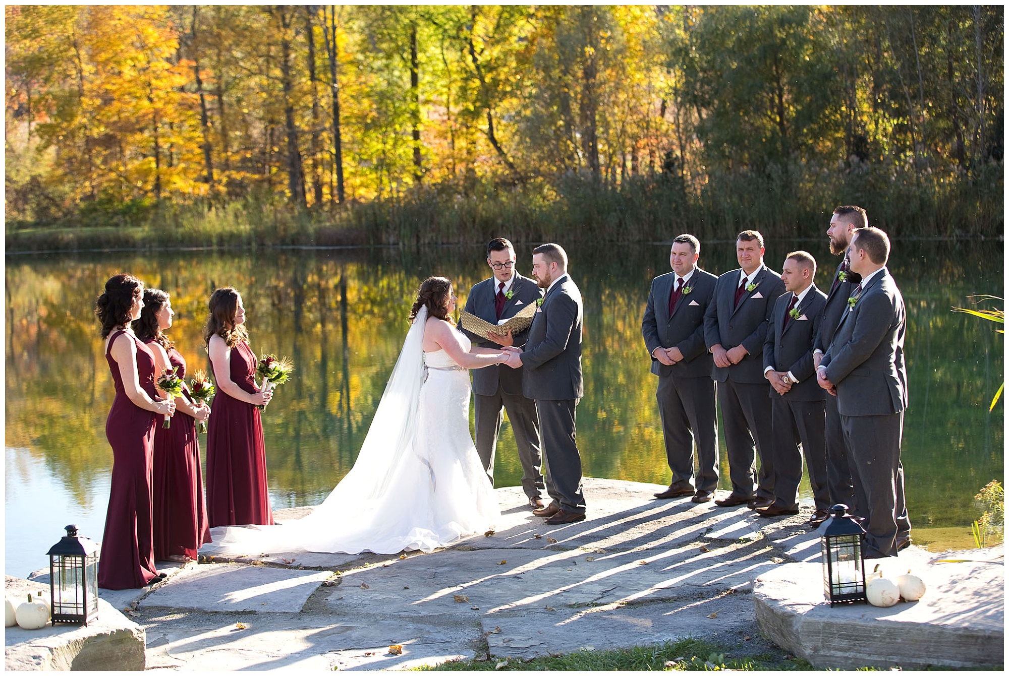 A wide angle shot of the entire wedding party during the ceremony.