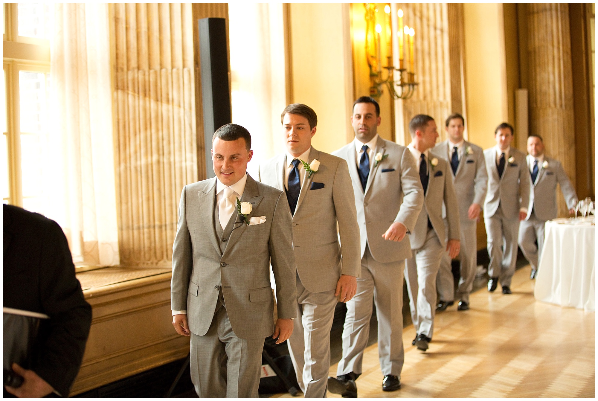 A groom and groomsmen procession to the wedding ceremony.
